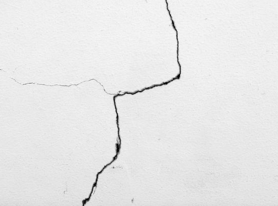 What causes cracks in your building?